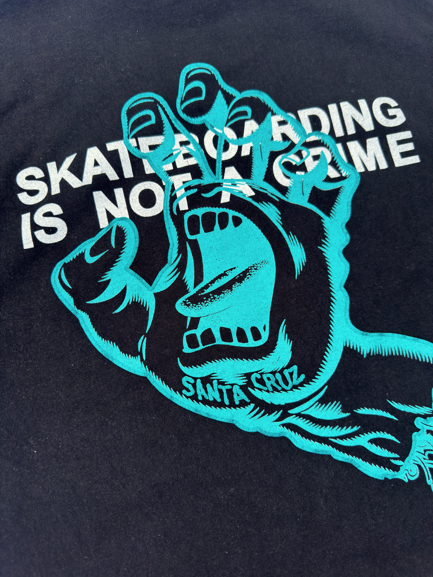 Santa Cruz “Skateboarding Is Not A Crime” Tee